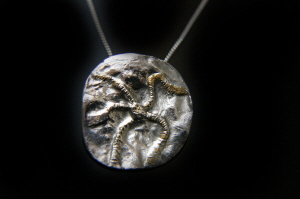 Unique Solid Silver And Gold Starfish Pendant